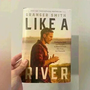 Brand new LIKE A RIVER hardcover book